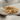 Twisted Cable X Ring, gold vermeil, product photo on linen cloth