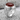 Past Master Carnelian Ring, polished, angled view on stone base