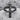 INRI Crucifix Ring, black rhodium plated, front view on stone surface
