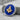 Masonic Square and Compasses Lapel Pin, two-tone finish, product photo on stone