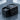 Scroll Secret Compartment Ring, black rhodium, open drawer on display stand