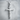 INRI Crucifix Pendant, polished, front view on stone pedestal