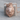 Crowned Royal Lion Pendant, rose gold, front product view on wood