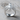 Tarantula Spider Ring, polished silver, front view on wooden surface