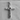 Forged Cross Pendant, polished, front view on stone display