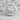 Agnus Dei ring, polished silver, front view on stone surface