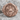 Saint Gabriel Cross Ring, rose gold, angled view on stone