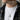 Man wearing the oxidized silver spinning triquetra pendant on a silver chain over a casual t-shirt and flannel