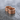 Two Finger Spell Storing Ring, rose gold finish, angled view on wet stone