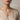 Model wearing the gold mermaid anchor pendant with chain showing hanging length and styling context