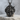 Viking Warrior Sword Pendant, black rhodium plated, front view on stone pedestal