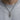 Oxidized sterling silver alchemical vessel necklace worn on chain over grey sweatshirt for men