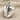 Warrior Helmet Ring, polished silver, product view on fabric
