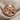 Benjamin Franklin Ring, rose plated silver, front view on textured fabric