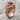 Double Ram Ring, rose plated silver, angled three-quarter view