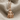 Kybele Goddess Earring, rose gold, front view on fabric