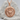 Virgo Memento Mori Medallion Pendant, rose gold, front view on stone