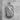 Saint Jude Thaddeus Pendant, polished silver, front view on stone pedestal
