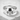 Low Profile Skull Band Ring, polished silver, front product view on concrete