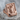 Joker signet ring, rose gold finish, angled front view on stone