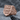 Three Lions Ring, rose gold, angled view on stone