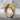 Swooping Eagle Ring, gold vermeil, angled product view on concrete