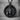 Hieroglyphic Anubis Pendant, black rhodium, front view on display pedestal