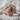 Twin dragon gemstone ring in rose gold finish on rock