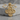 Christ Pantocrator Cross Pendant, gold vermeil, front view on stone pedestal