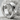 Pyramid hoop earring, polished, product photo on stone