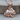 Crouching Rabbit Pendant, rose gold, product photo on wood