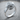 Abstract Swirl Ring, polished silver, angled product photo on wood