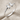 Fascinus Stacking Ring, polished, angled view on fabric