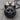 Longhair Cat Face Pendant, black rhodium, product photo on wood