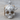 Angel Skull Pendant, polished, product photo on wood display