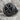 Chi Rho Signet Ring, black rhodium, angled front view on stone