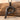 Bird letter P pendant in black rhodium plated finish on driftwood