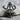 Pumpkin skull pendant in black rhodium finish on stone surface
