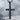 Dimpled Texture Cross Pendant, black rhodium finish, front view on stone