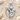 Mother Baby Sun Pendant, polished silver, front view on sand
