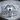 Spartan Helmet Skull Ring, polished silver, front view on wood