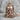 Wise Wizard Pendant, rose gold, front view on stone surface