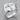 Pardon Crucifix Scrollwork Ring, polished, product photo on stone
