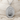 Cancer Branching Stars Pendant in polished silver, studio product photo