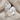 Draped Volute Open Ring, polished, angled front view