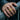 Bold razor blade ring worn on a man's hand showcasing the chunky signet design and intricate Live Sharp engraving