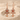 Carnelian Ankh Earring, rose gold, front view in sand