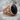 Black Onyx Skull Ring, rose gold, product photo on stone