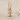 Ankh Drop Earring, rose gold, product photo on sand