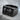 Built Not Born Dumbbell Ring, black rhodium, product photo on stone surface